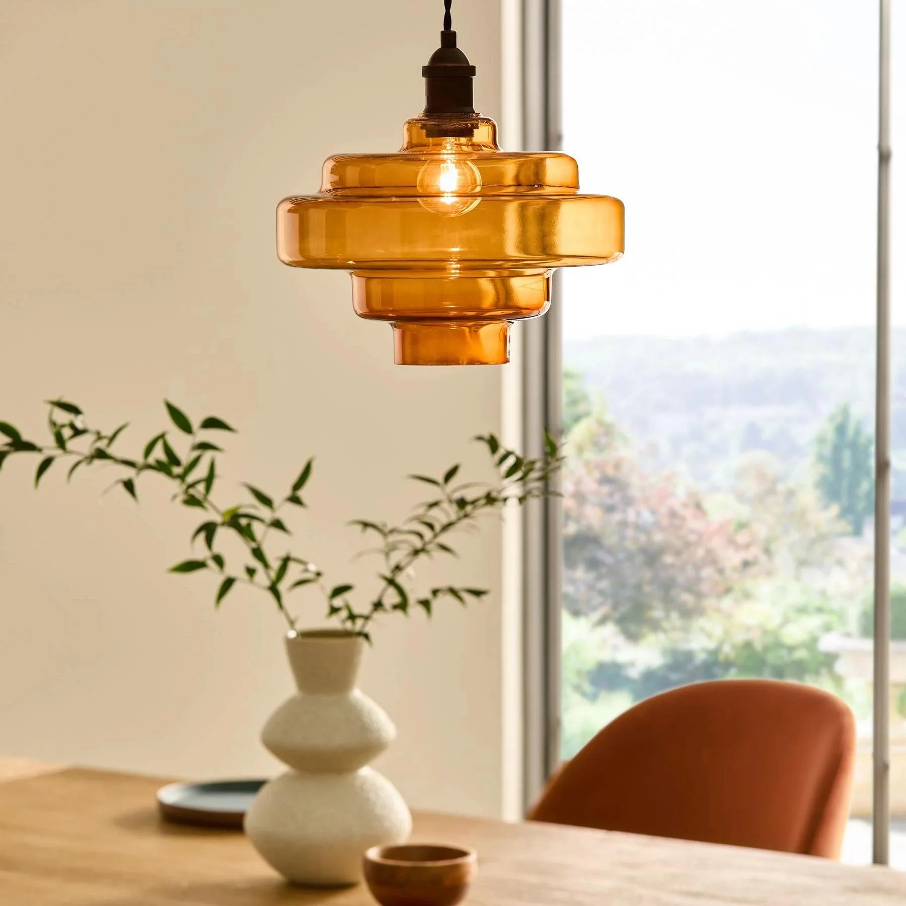 Valenra Macaron Orange Glass Pendant Light scene1.webp__PID:7e17f1e0-a62e-4f1c-bf0a-0a49b2016c85