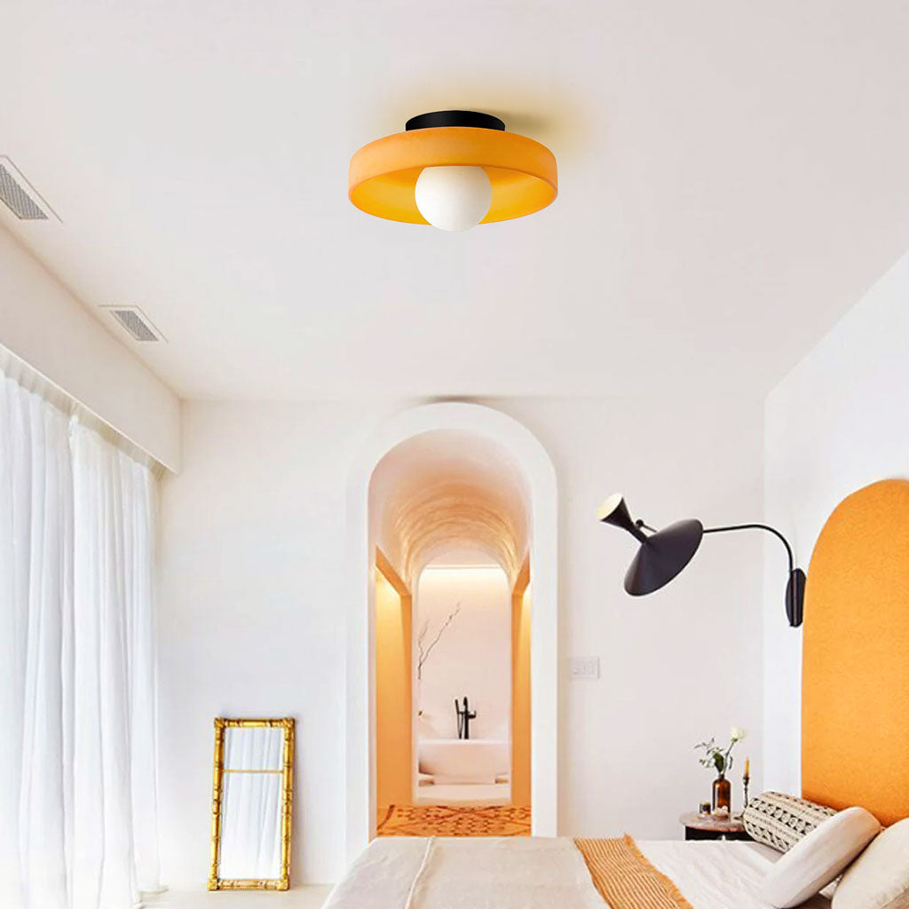 morrow glass disc light ceiling orange.jpg__PID:c04c02d0-676f-4a49-9f7e-21cb4a0e73b3