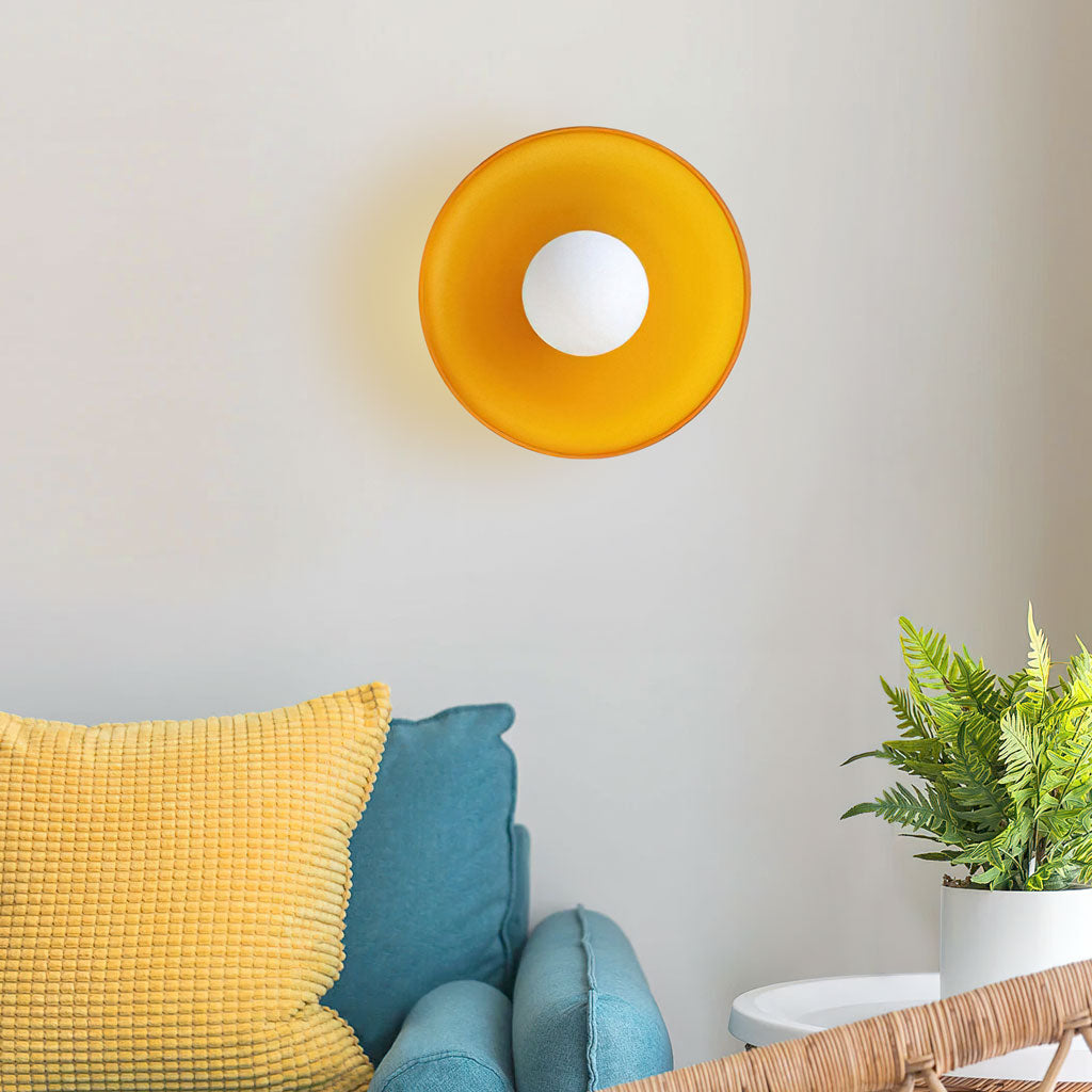 morrow glass disc light wall orange.jpg__PID:4a0e73b3-0d89-43ce-af79-7b1526c5c739