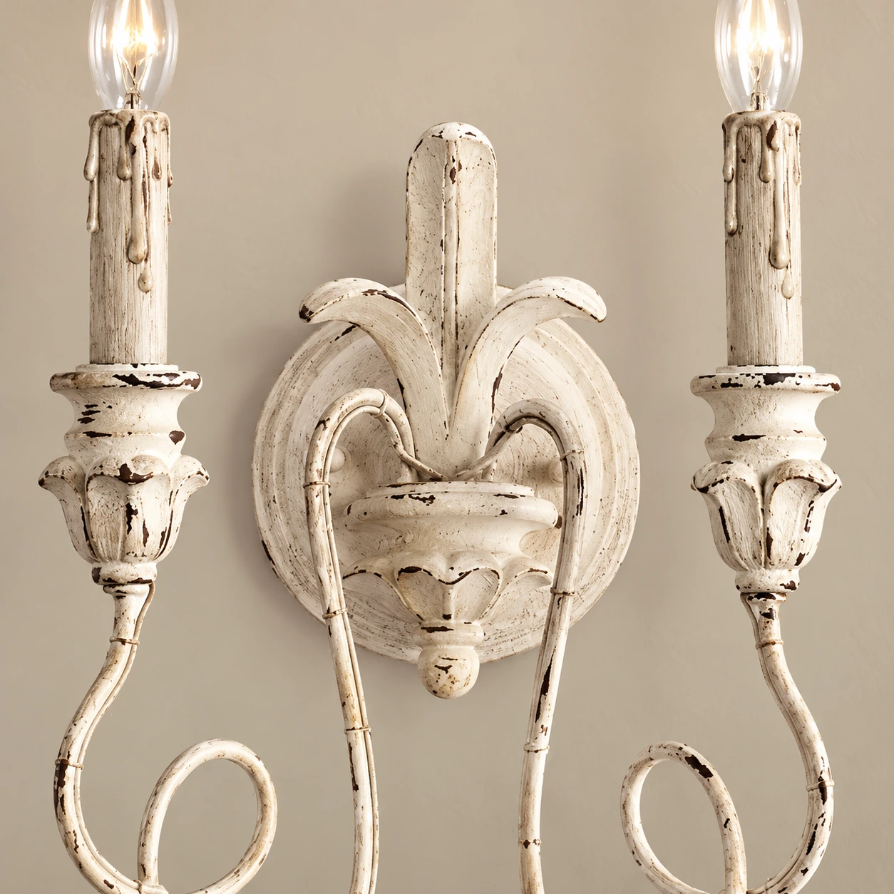 Close detail of Cassia central carved heart rosette and candle sockets