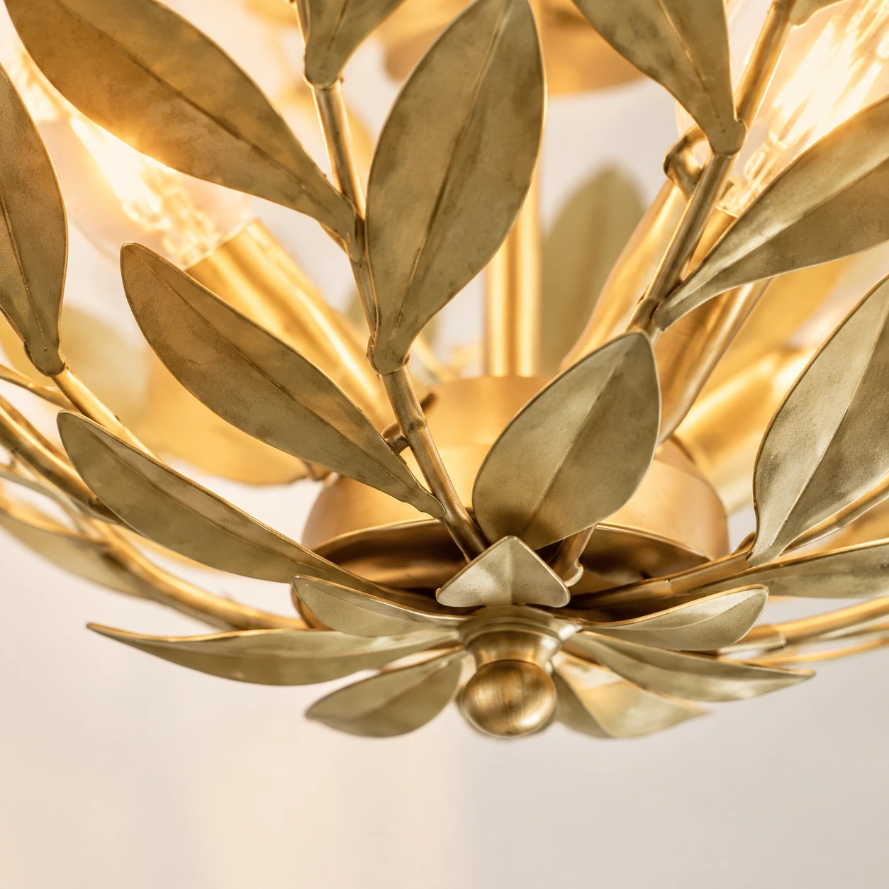 Close view of the lower leaf branches and rounded finial